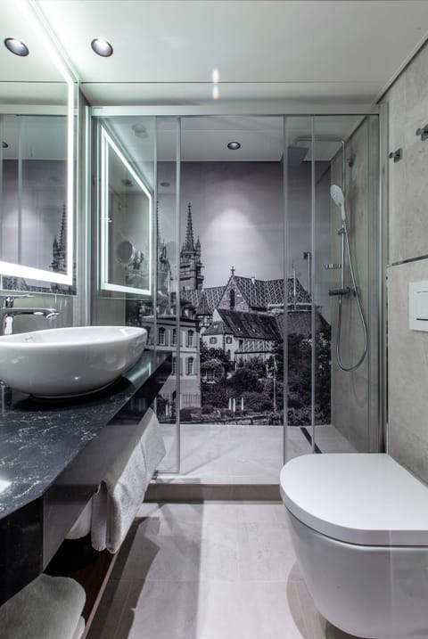 Room (Individual) | Bathroom | Rainfall showerhead, eco-friendly toiletries, hair dryer, towels
