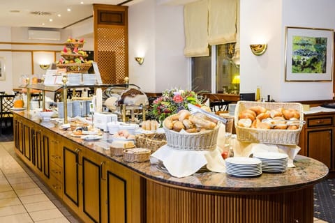 Daily buffet breakfast (EUR 18 per person)