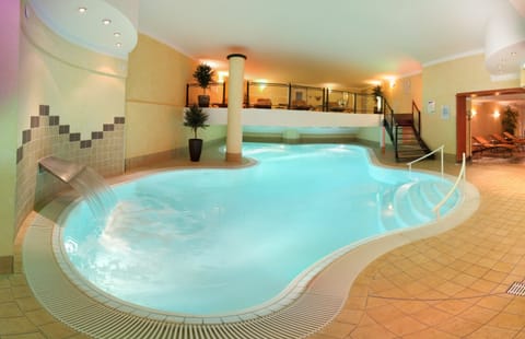 Indoor pool, seasonal outdoor pool, open 7 AM to 9 PM, pool umbrellas