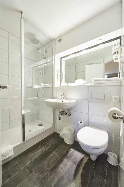 Eco-friendly toiletries, hair dryer, towels