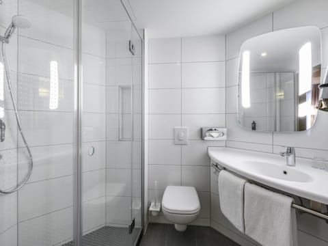 Shower, eco-friendly toiletries, hair dryer, towels