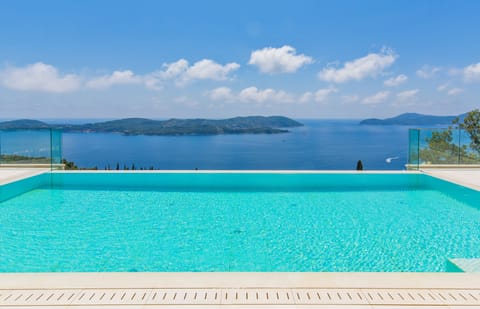 Seasonal outdoor pool, pool umbrellas, sun loungers