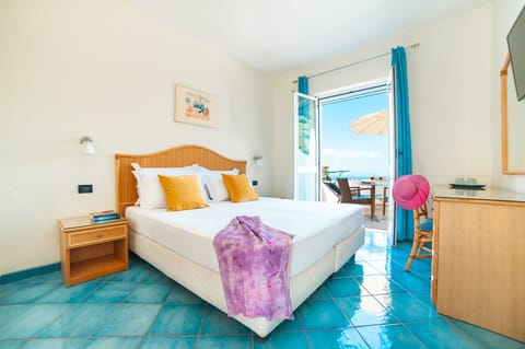 Double or Twin Room, Sea View | Minibar, in-room safe, desk, blackout drapes