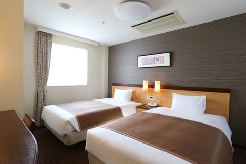 Down comforters, iron/ironing board (on request), WiFi (free)