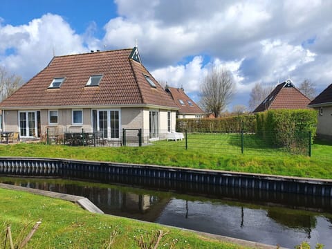 Cloud, Plant, Sky, Water, Property, Building, Natural Landscape, Tree, Window, Land Lot