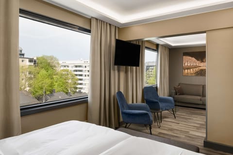 Family Room | Premium bedding, memory foam beds, in-room safe, desk