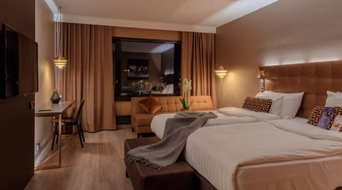 Premium bedding, memory foam beds, in-room safe, desk