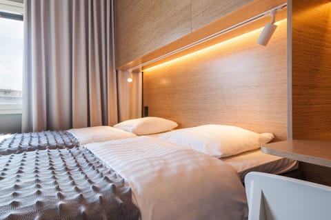 Desk, blackout drapes, soundproofing, free WiFi