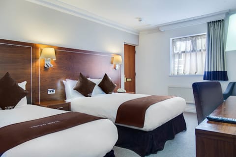 Premium Family Room | Pillowtop beds, desk, laptop workspace, blackout drapes