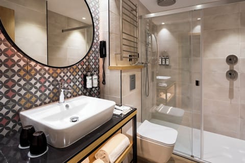 Eco-friendly toiletries, hair dryer, towels