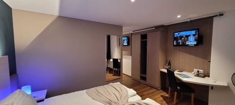 Economy Quadruple Room | Premium bedding, Select Comfort beds, in-room safe, desk