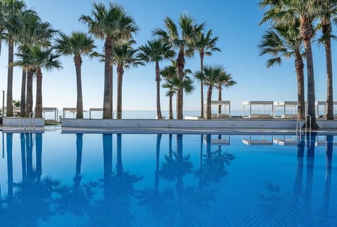 Indoor pool, 2 outdoor pools, pool umbrellas, sun loungers