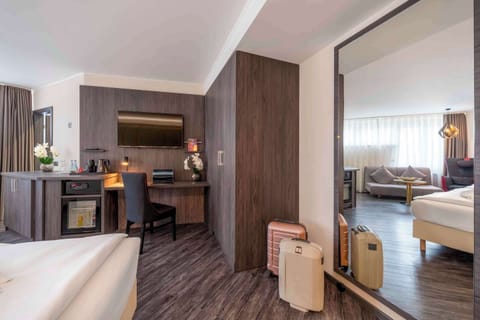 Premium Room, 3 Twin Beds (Cozy Sitting Corner) | Minibar, in-room safe, desk, blackout drapes