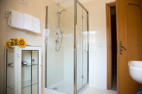 Room, 2 Bedrooms, Connecting Rooms | Bathroom | Shower, free toiletries, hair dryer, towels