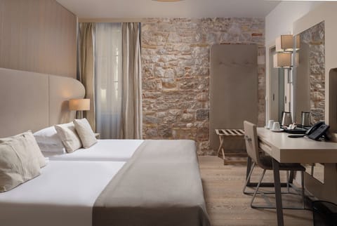 Superior Double or Twin Room | Minibar, in-room safe, desk, blackout drapes