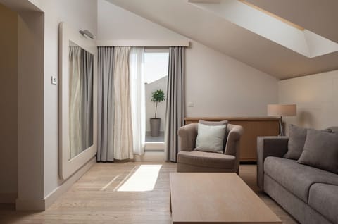 Superior Junior Suite, Balcony | Living area | Plasma TV