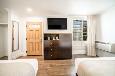 Family Room, 2 Queen Beds | Premium bedding, pillowtop beds, blackout drapes, iron/ironing board