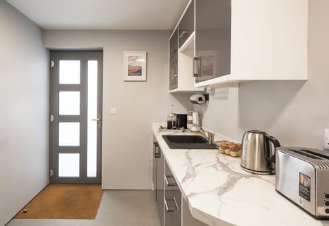 There is a kitchenette on entry to the accommodation.