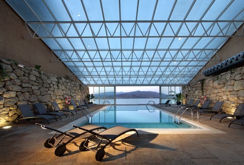 Indoor pool, open 4:30 PM to 8:30 PM, sun loungers
