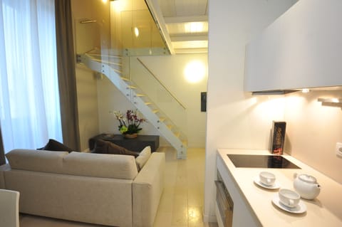 Deluxe Apartment | Private kitchen | Full-size fridge, oven, stovetop, dishwasher