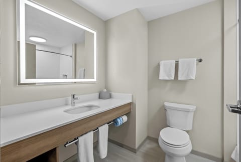 Standard Room, 2 Queen Beds | Bathroom | Combined shower/tub, free toiletries, hair dryer, towels