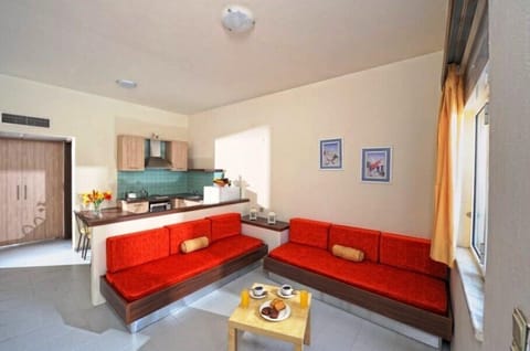 Apartment, 1 Bedroom | Living area | LCD TV
