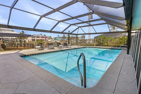 Private Heated Swimming Pool
Screened Lanai 
Outdoor Furniture for Ample Seating 
Propane Fire Pit