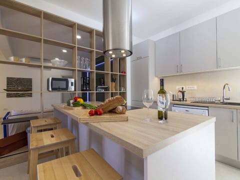 Villa | Private kitchen | Electric kettle, highchair