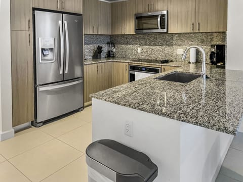 Fridge, microwave, coffee/tea maker, paper towels