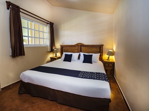 Premium bedding, desk, laptop workspace, iron/ironing board