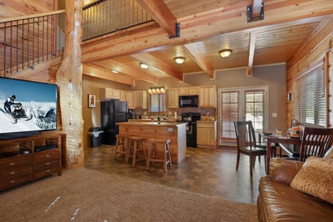 Chalet (3 Bedrooms) | Living area | Flat-screen TV, toys