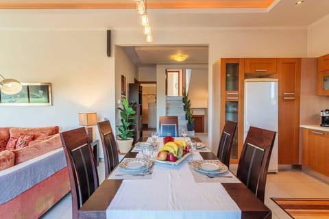 Dining Table with Local Flavors – Elegant dining setup ready for sharing meals and enjoying authentic cuisine.