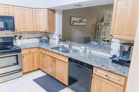 Kitchen view with pass through into dining room.