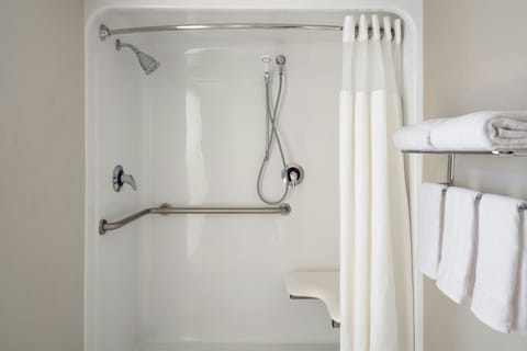 Combined shower/tub, designer toiletries, hair dryer, bathrobes