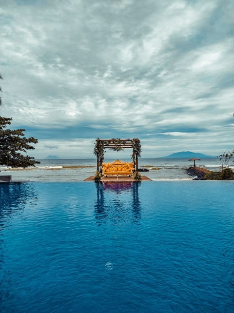 Outdoor pool, open 6:00 AM to 9:00 PM, sun loungers