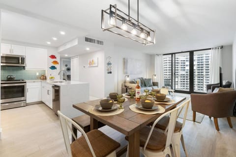 The light, bright dining and living areas offer ample seating and gathering space for the whole family.