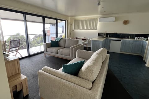 Full view of the entire living/dining/kitchen area