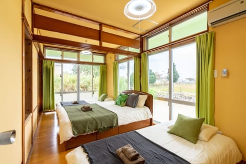 Executive Suite | Blackout drapes, iron/ironing board, WiFi (free), bed sheets
