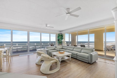 Open flow between the living area, dining area, and kitchen.