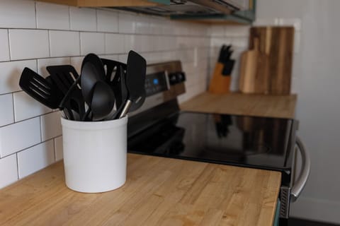 upgraded stainless steel appliances and fully stocked kitchen & pantry supplies