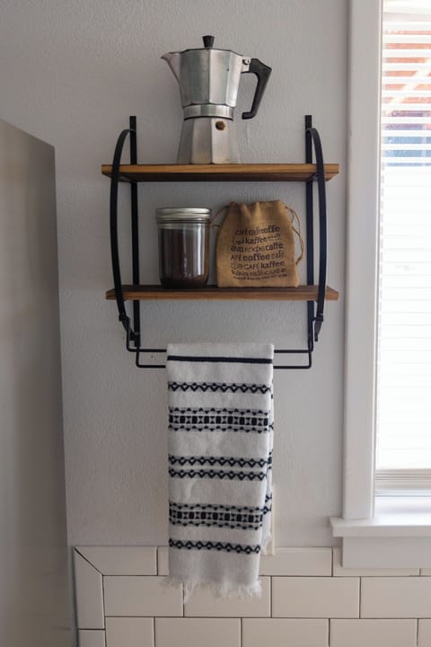 upgraded stainless steel appliances and fully stocked kitchen & pantry supplies