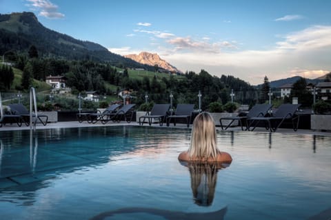 Outdoor pool, a rooftop pool, sun loungers