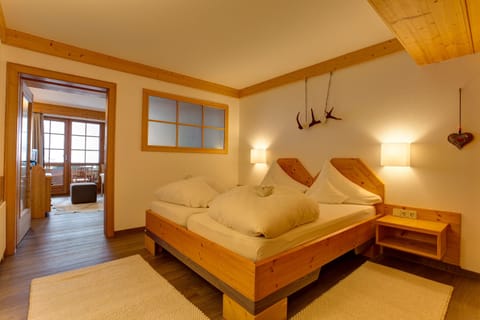 Suite, Balcony, Mountain View (Dorfplatz) | Minibar, in-room safe, desk, iron/ironing board