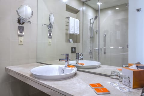 Shower, eco-friendly toiletries, hair dryer, bidet