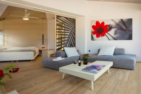 Premium Suite, 1 King Bed, Jetted Tub, Sea View | Living area | Flat-screen TV