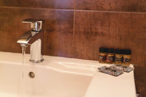 Standard Double Room, 1 Bedroom | Bathroom | Free toiletries, hair dryer, towels, soap