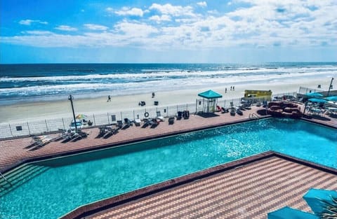 Pool with gated beach access. 