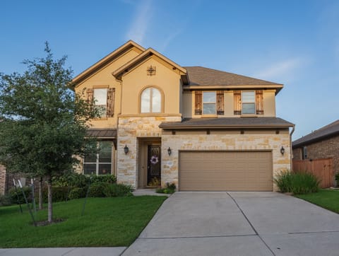 front of the house, 4 car parking in driveway plus street parking
