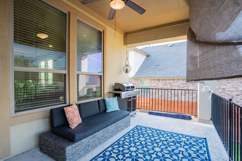 Patio with 4 burner gas grill. 