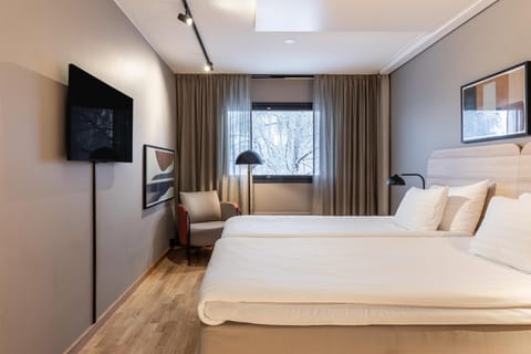 Standard Room (Family Three) | Minibar, free cribs/infant beds, free WiFi, bed sheets